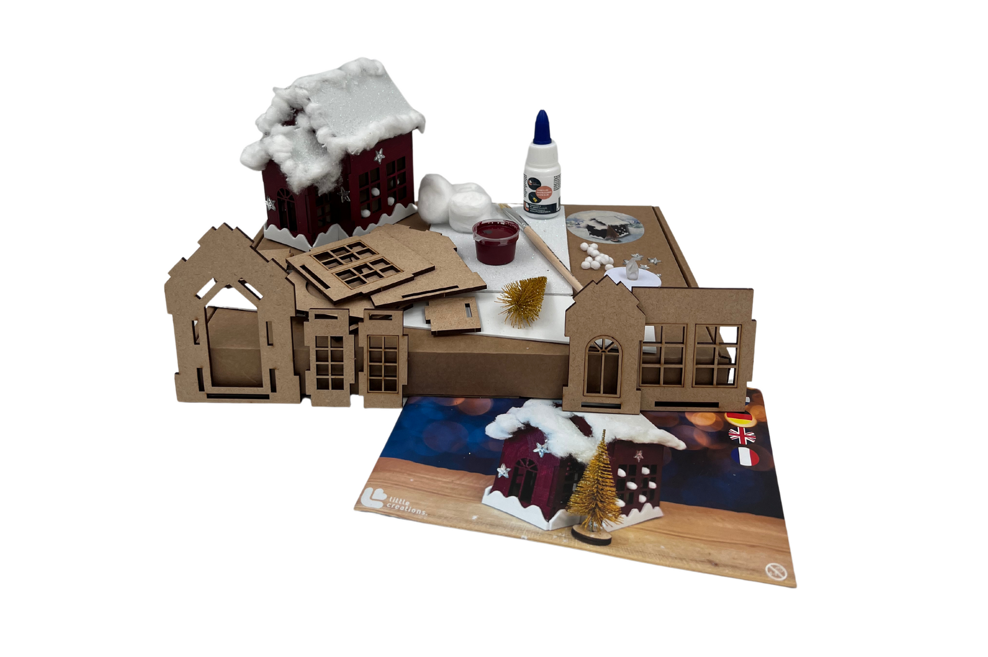 Inhoud van het rode houten kersthuis van het DIY pakket van Little Creations